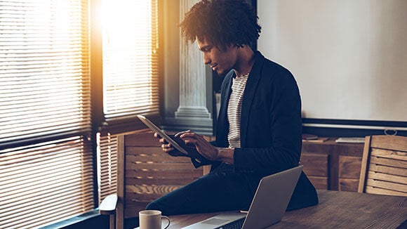 man on computer