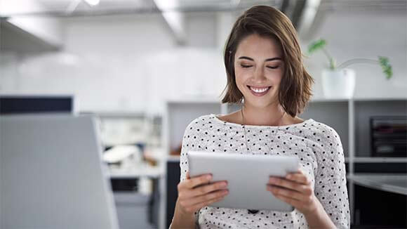 woman--smiling-ipad woman--smiling-ipad