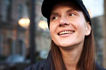 Woman with baseball cap