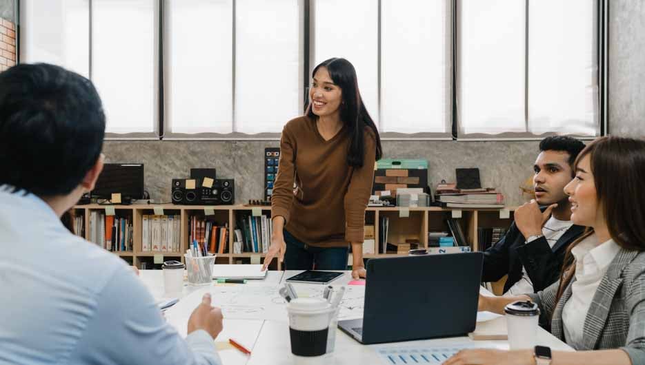 Multiracial group of young creative people in smart casual wear 