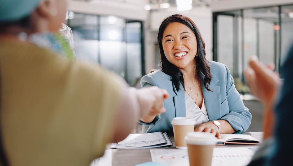 Business woman, handshake and success in onboarding, meeting and